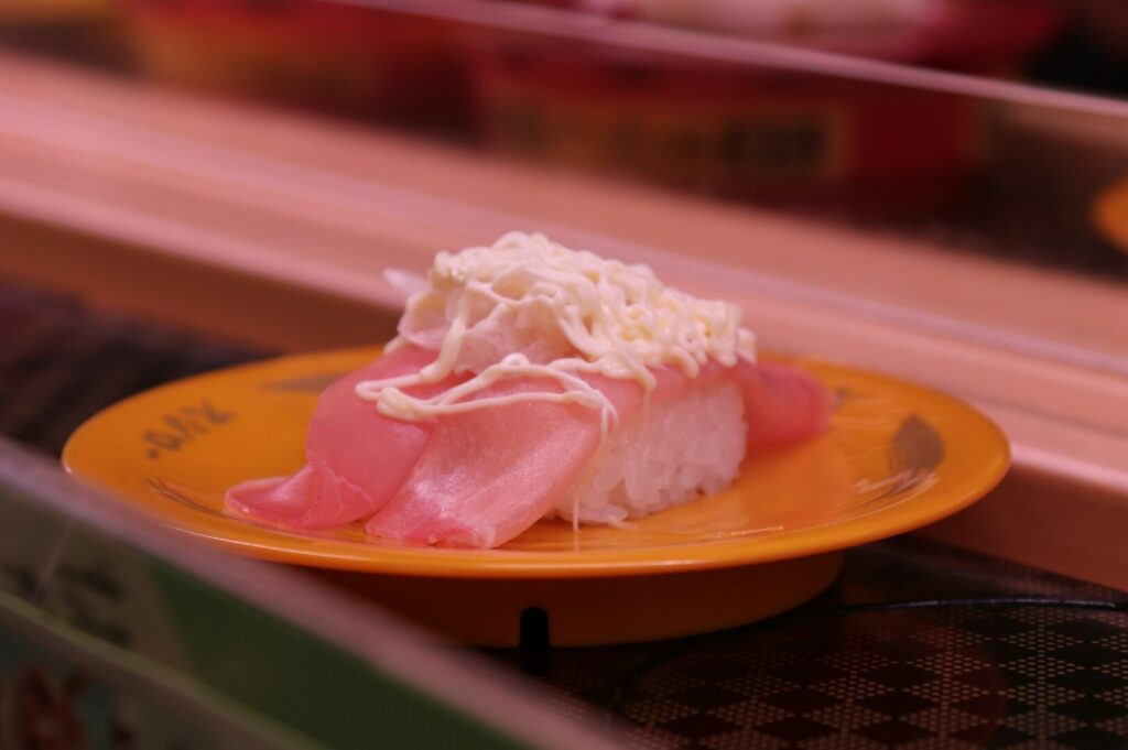 A beautifully arranged plate of sushi on a table, showcasing the artistry of Japanese cuisine at Sushi Masa in Singapore.