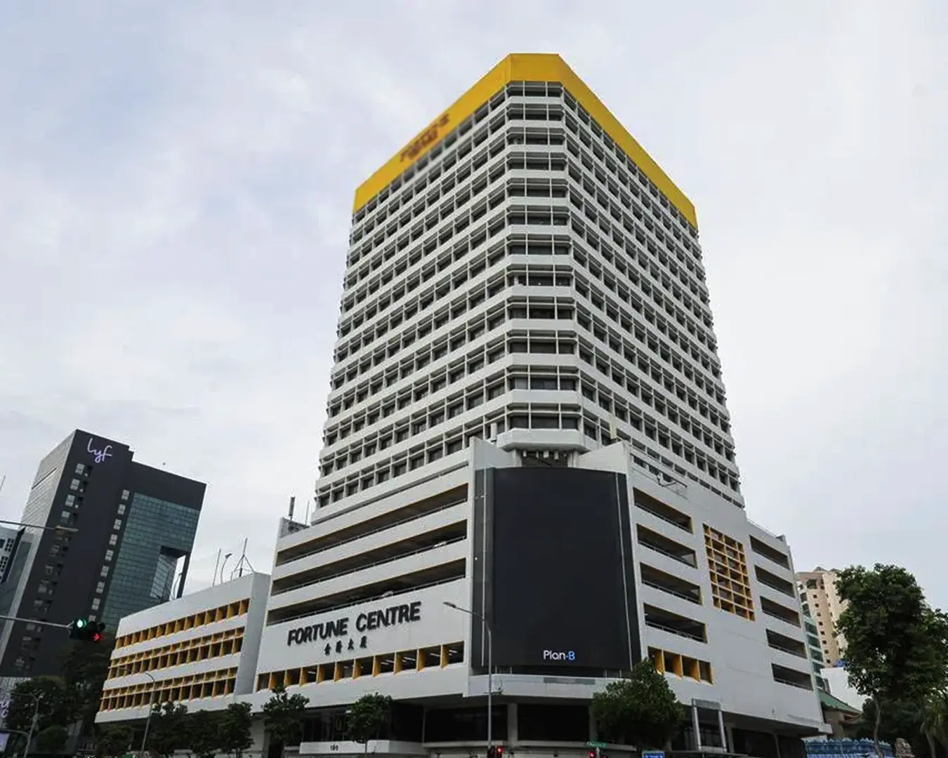 Exterior view of Fortune Centre building in Singapore, a well-known food hub with multiple small eateries and cafés inside, popular among locals for affordable Japanese, Korean, and vegetarian dining option